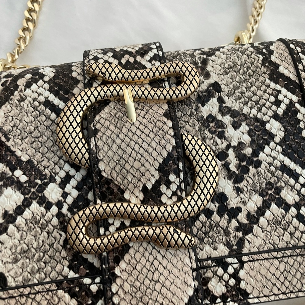 SOLD. Express shoulder snake print bag